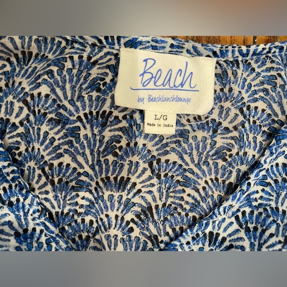 Beach by Beachlunchlounge
Blue and White Floral Top - Picture 3 of 11